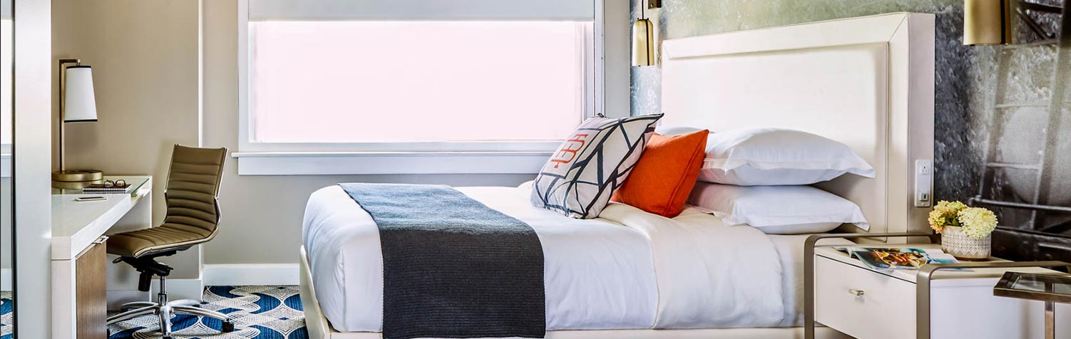 Bedroom with desk and window